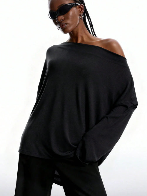 NOIRÉ LACE BACK TOP